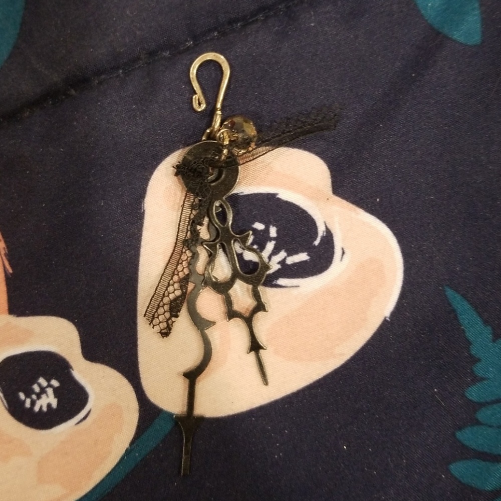Clock hand pendant